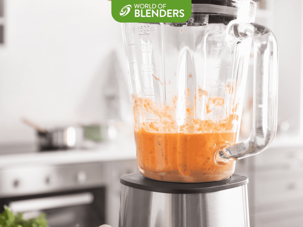 orange smoothie in a blender