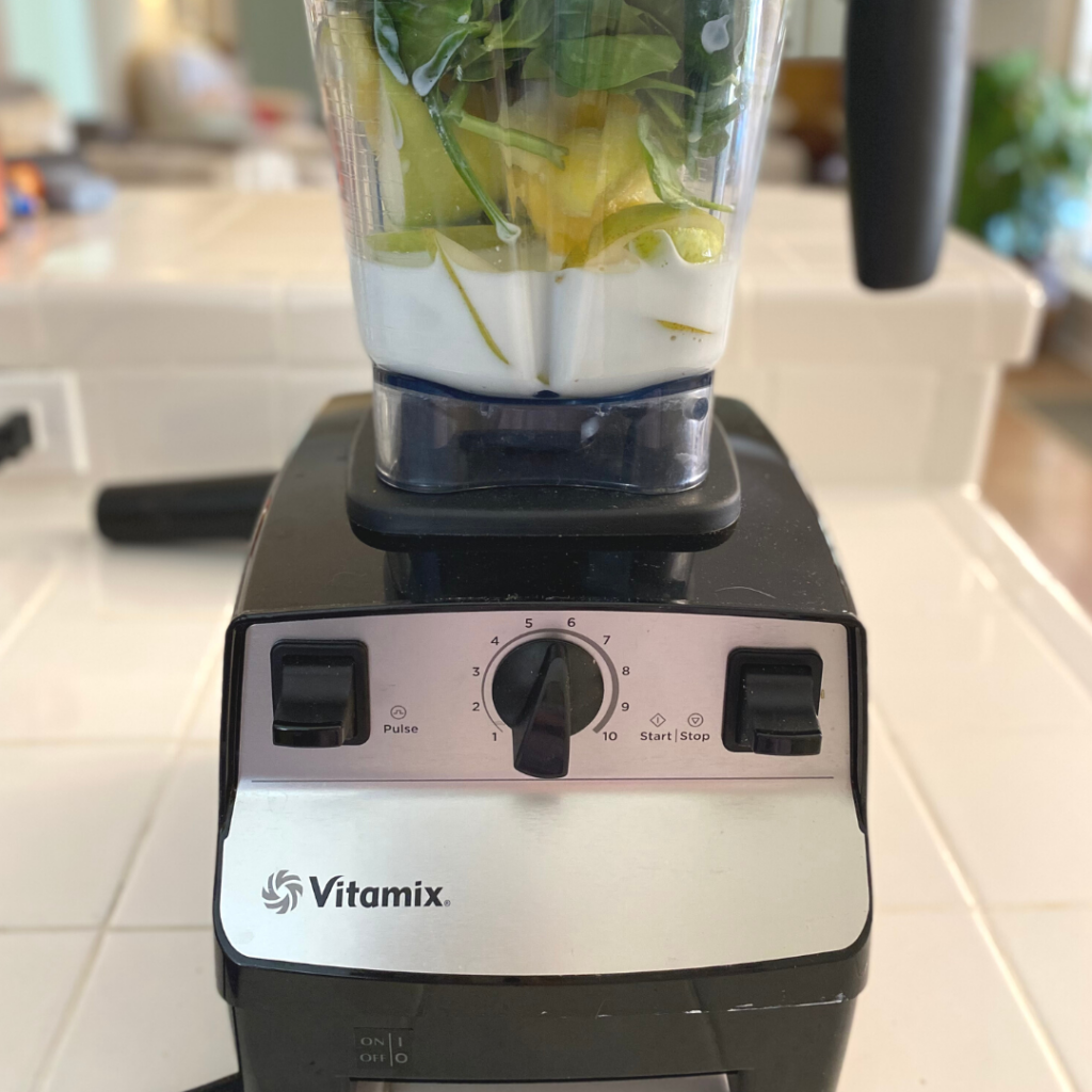 vitamix base with green smoothie
