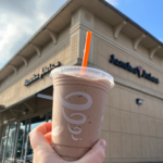 jamba juice smoothie in front of store sign