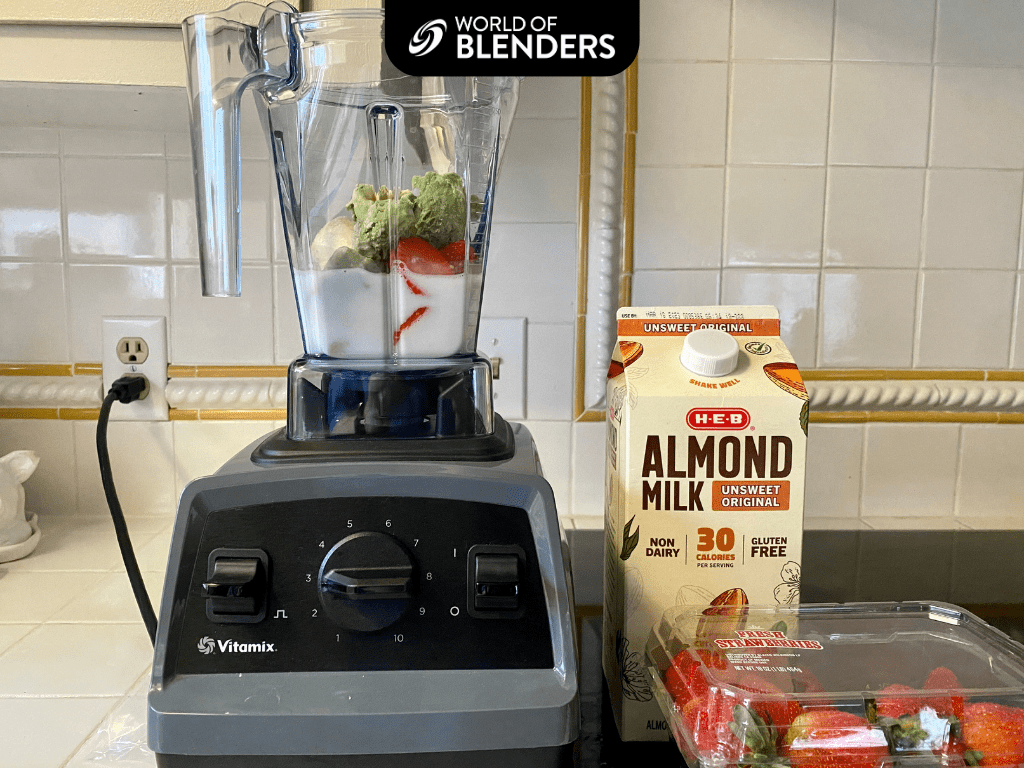 banana, avocado and strawberries in a blender to make a smoothie