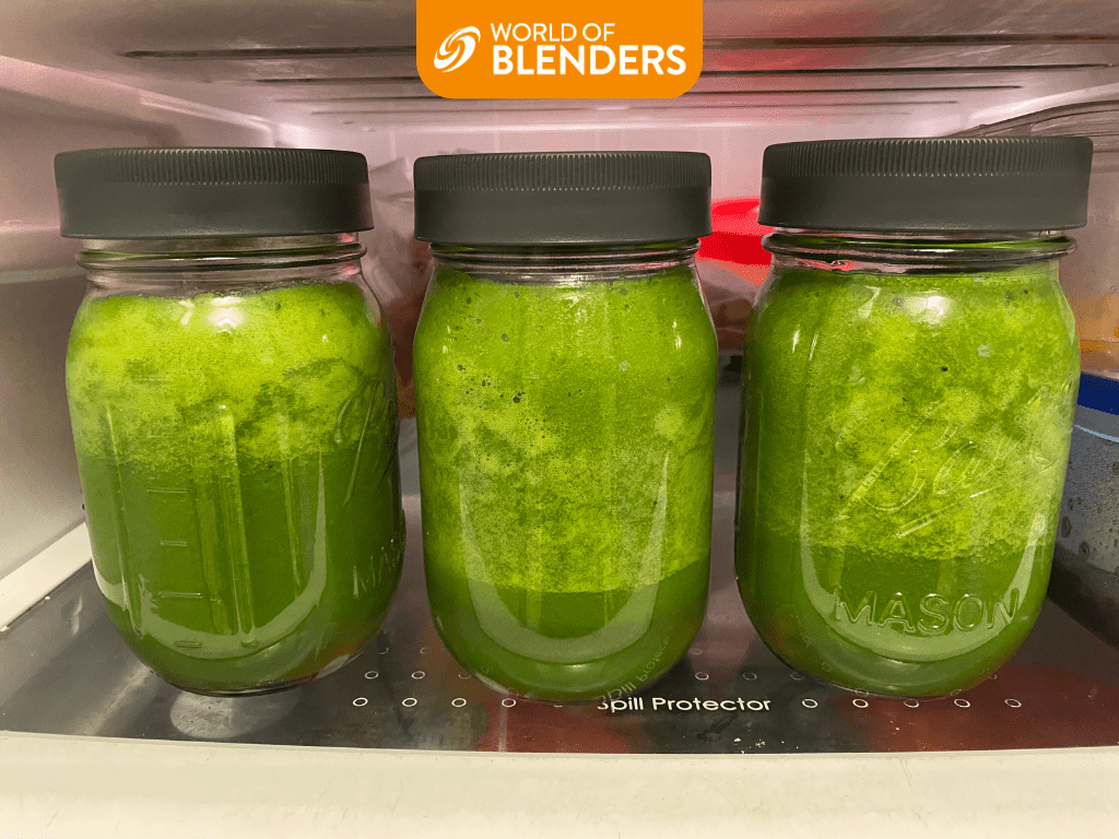 green smoothies in jars in the fridge