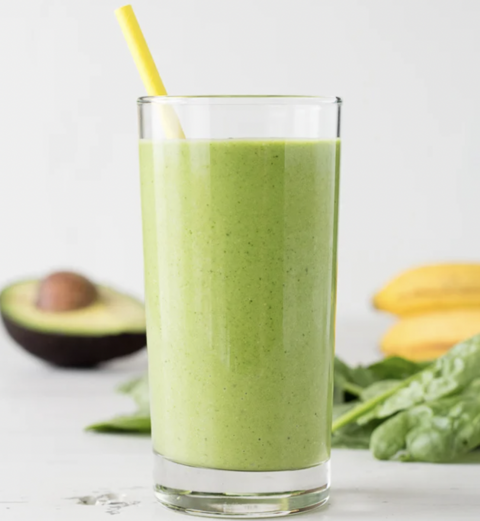 Spinach avocado smoothie in a glass