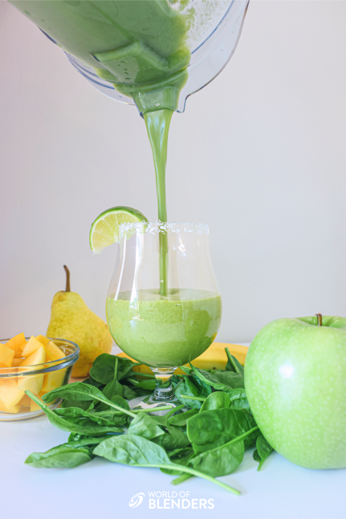 apple banana smoothie pouring into glass