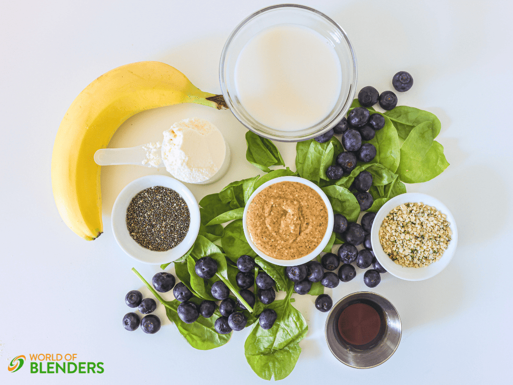 high protein green smoothie ingredients on a white table